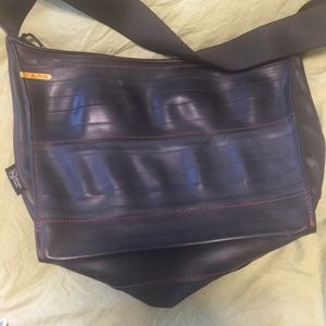 Alchemy Goods recycled tire tube purse